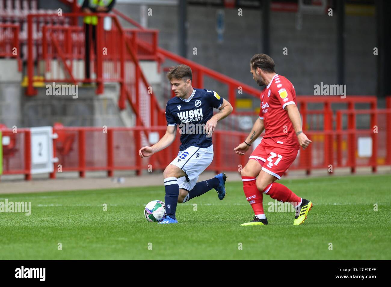 Ben Thompson (8) of Millwall FC runs down the wing with Dannie Bulman (21) of Crawley Town Stock Photo
