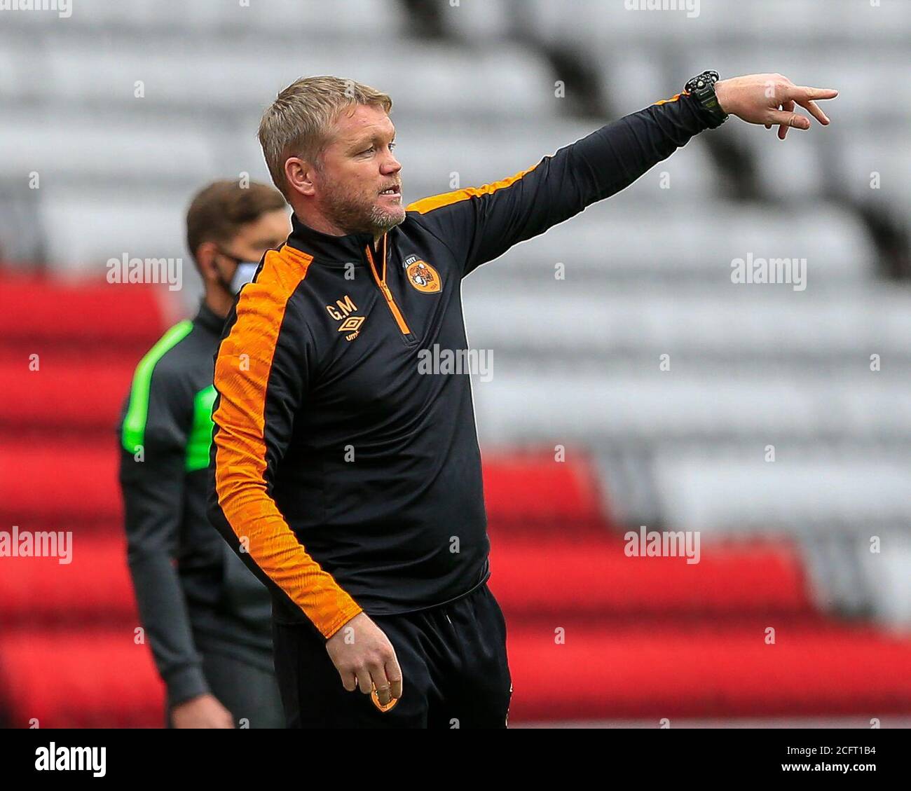 Hull City manager, Grant McCann, gives his team instructions Stock Photo