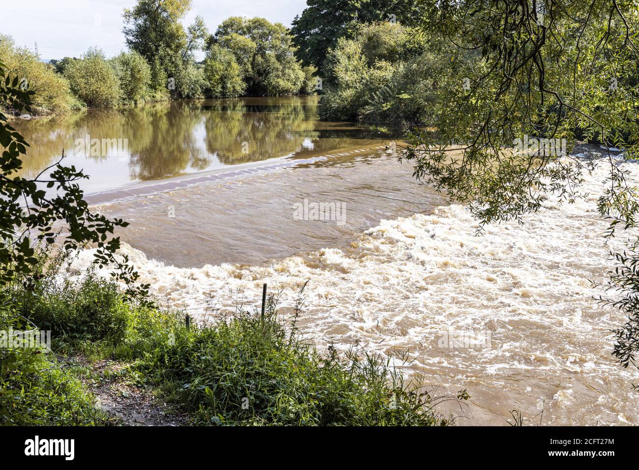 The weir on the River Severn at Upper Parting near the Severn Vale village of Maisemore, Gloucestershire UK Stock Photo