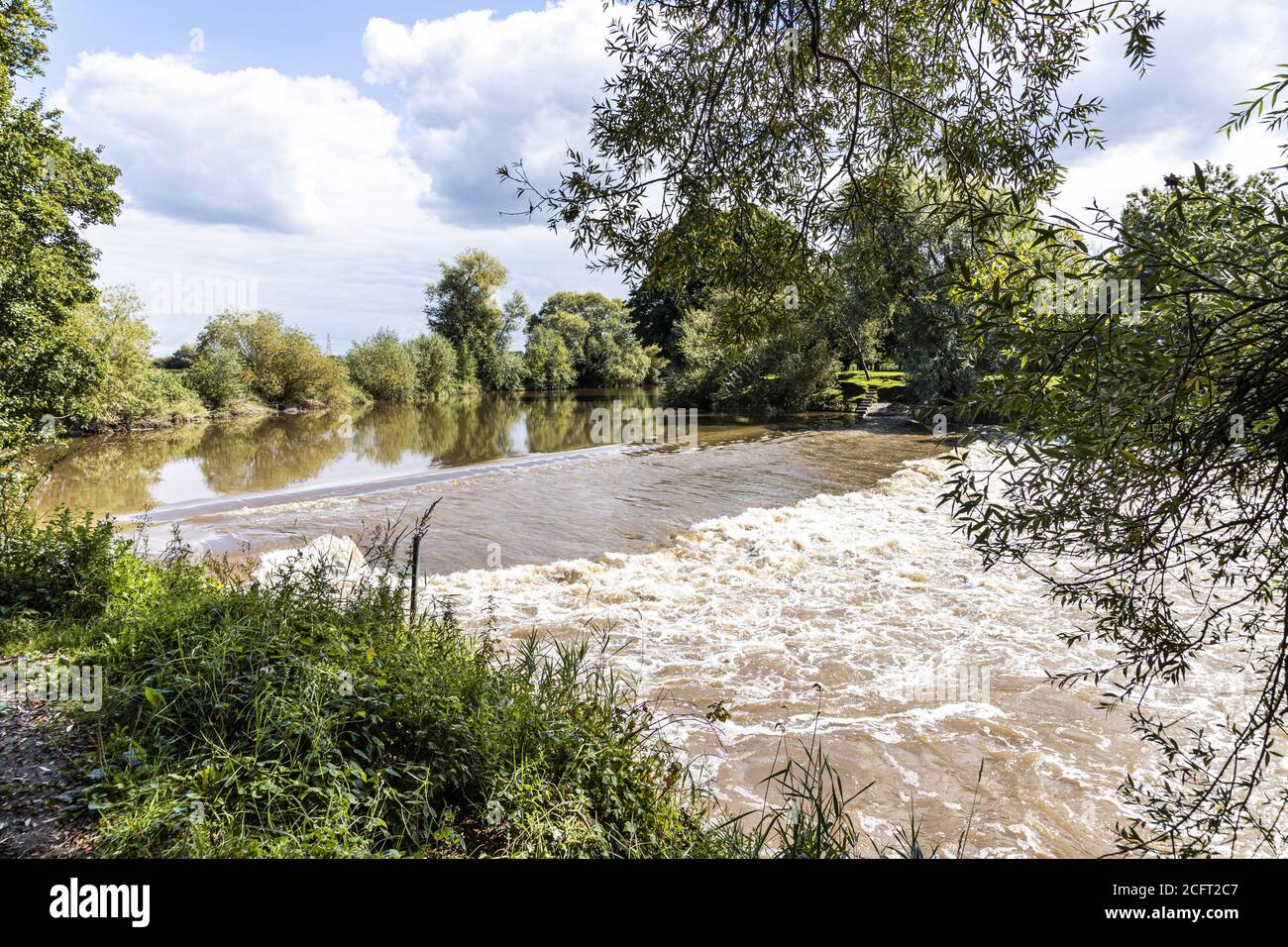 The weir on the River Severn at Upper Parting near the Severn Vale village of Maisemore, Gloucestershire UK Stock Photo