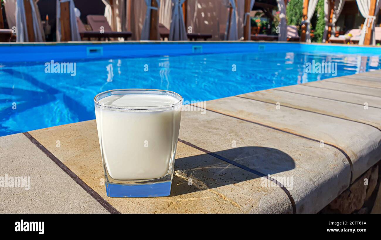 Protein drink for the athlete. Sports morning by the pool. Fermented ...