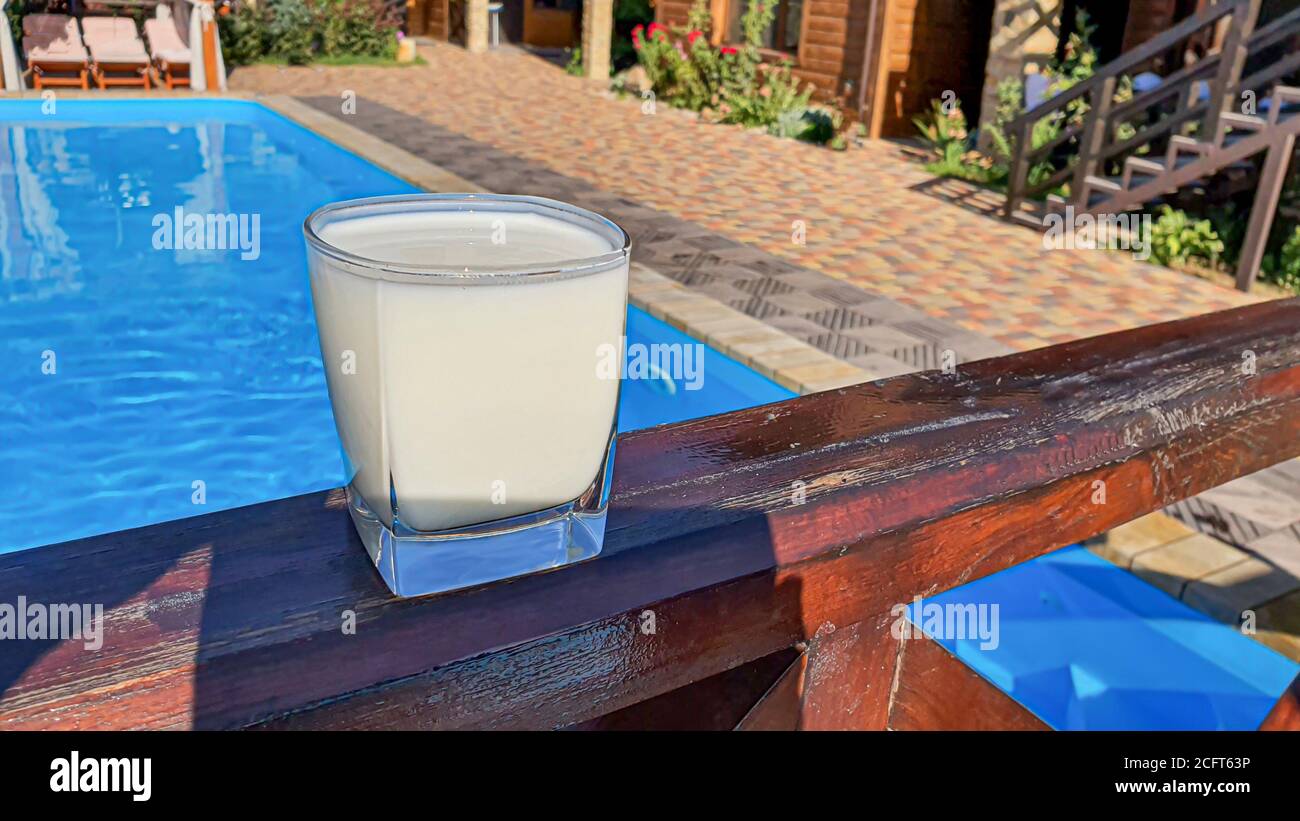 Protein drink for the athlete. Sports morning by the pool. Fermented ...