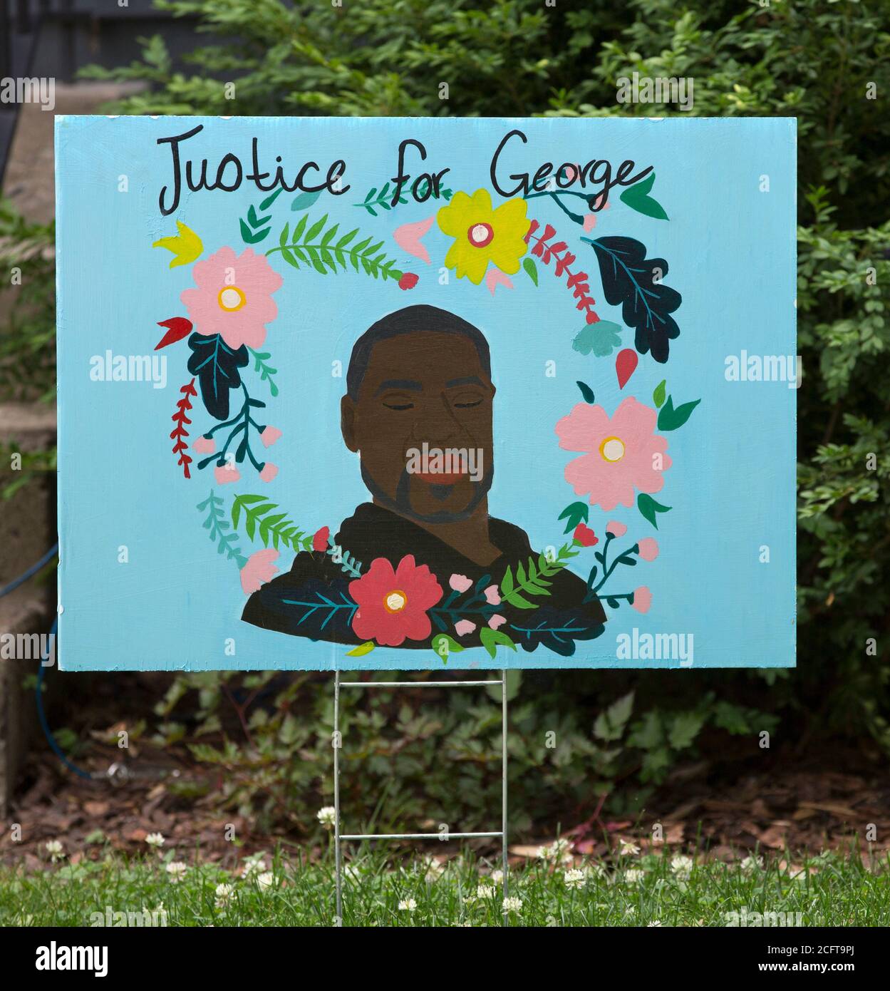 A memorial yard sign for George Floyd with the statement Justice for George in Minneapolis, Minnesota Stock Photo