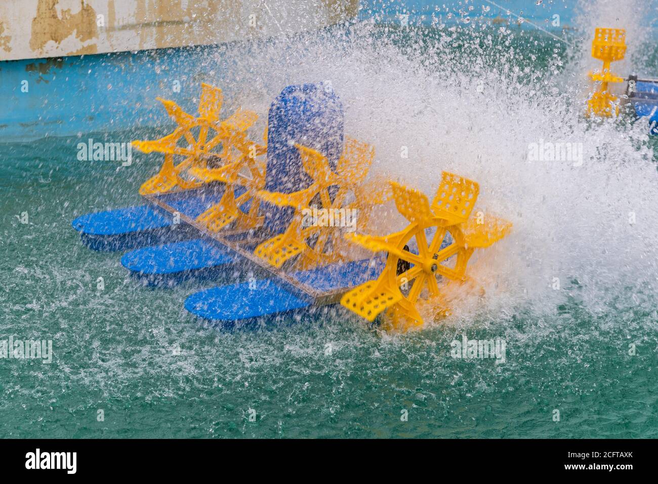 Rotating Paddle Wheels at Water in Aquaculture Pond Stock Photo - Alamy