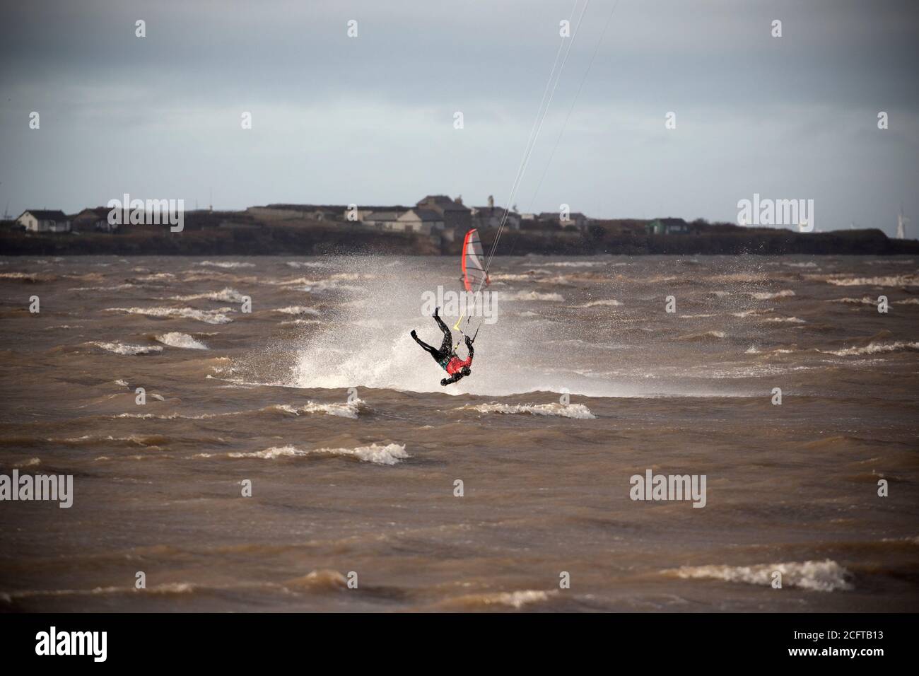 Kite Surfer Wiping Out in Rough Weather Stock Photo