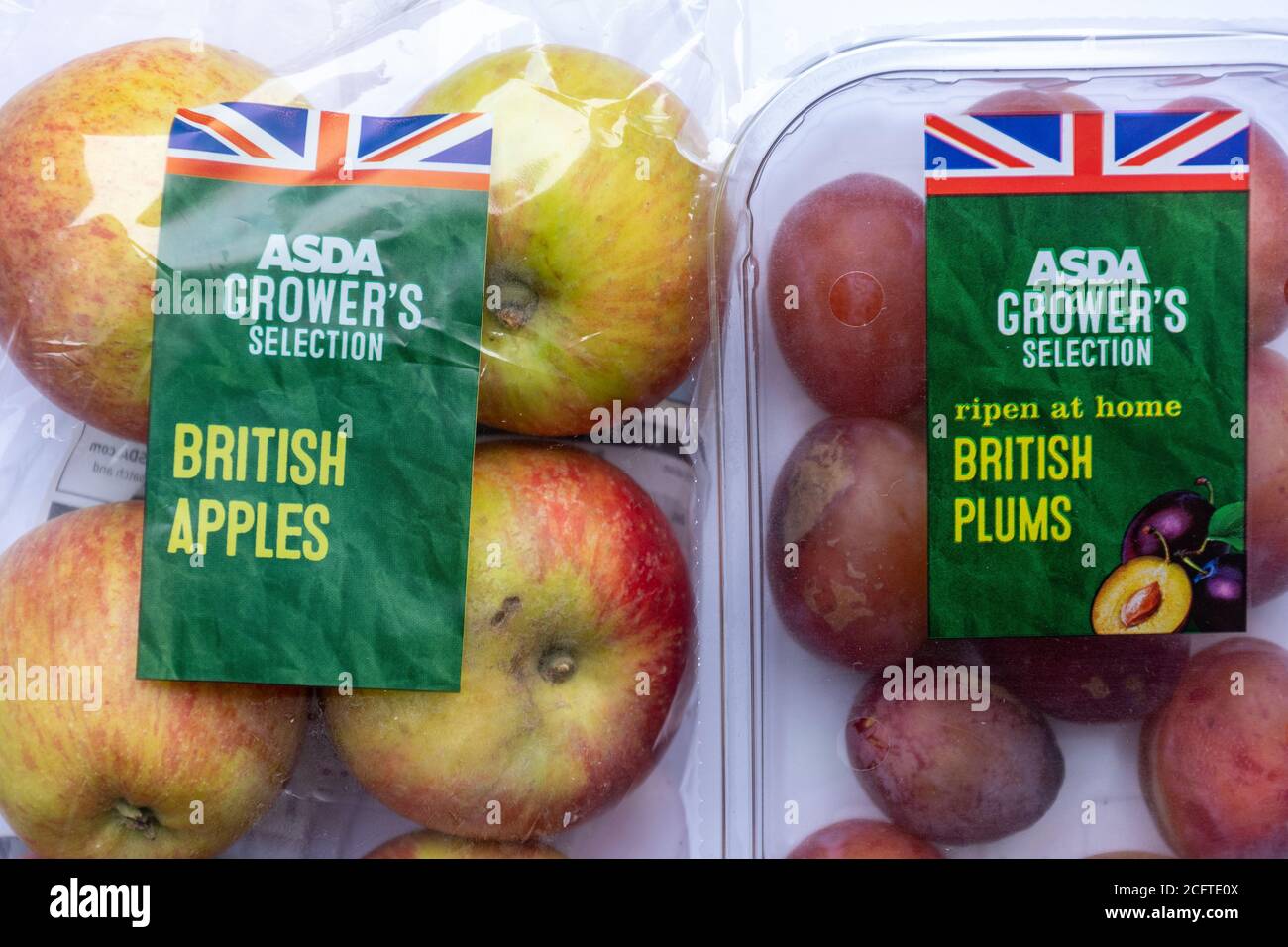 Packs of British fruit in Asda supermarket plastic packaging Stock Photo