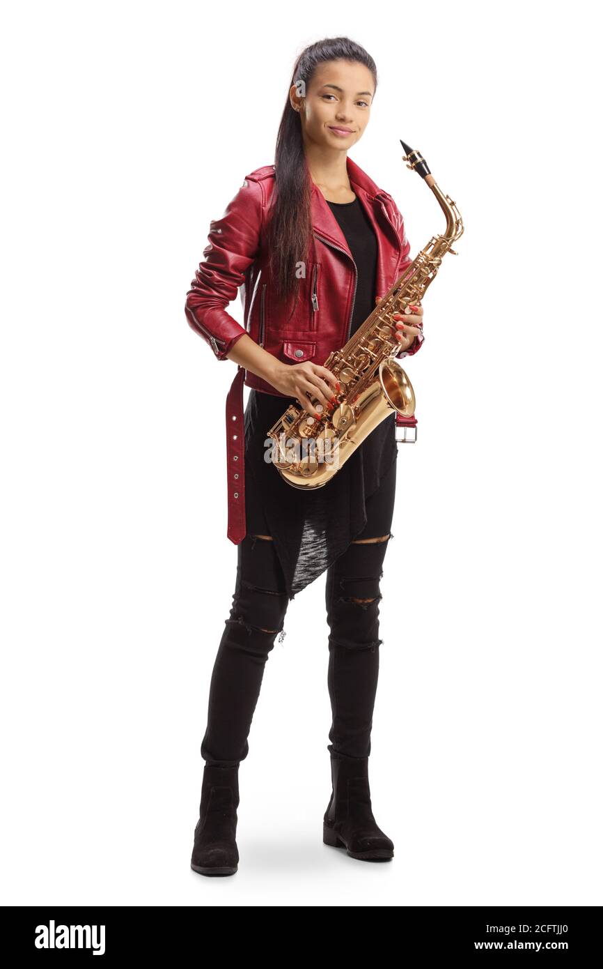 Full length portrait of a female saxophonist in a red leather holding a saxophone isolated on white background Stock Photo