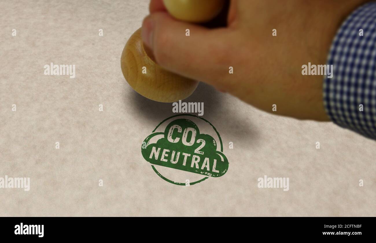 CO2 carbon neutral emission stamp and stamping hand. Ecology, nature