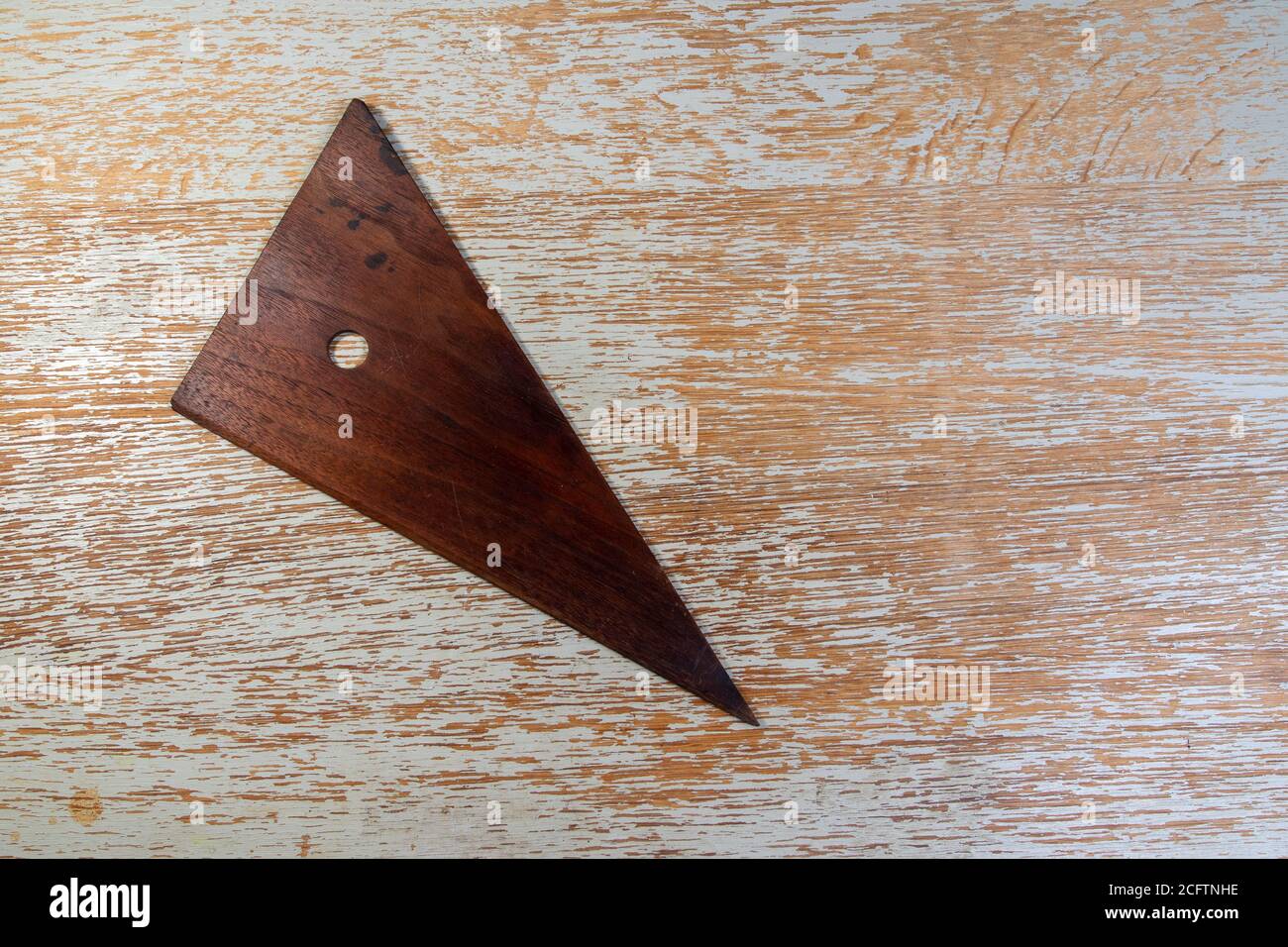 A vintage carpenter's wooden triangle square Stock Photo Alamy