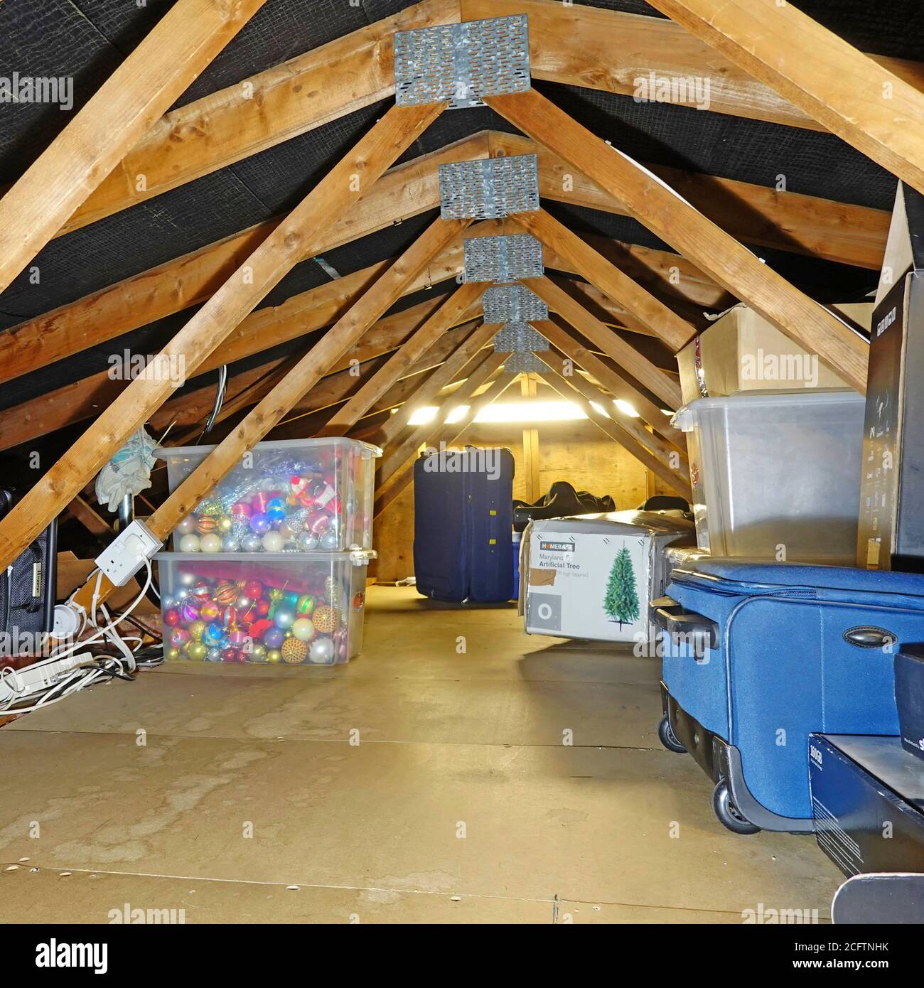 Boxes, Books and other things in Attic Storage Stock Photo - Alamy