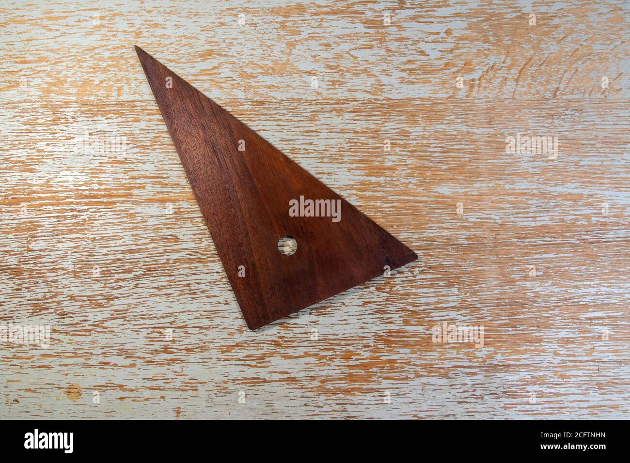 A vintage carpenter's wooden triangle square Stock Photo Alamy