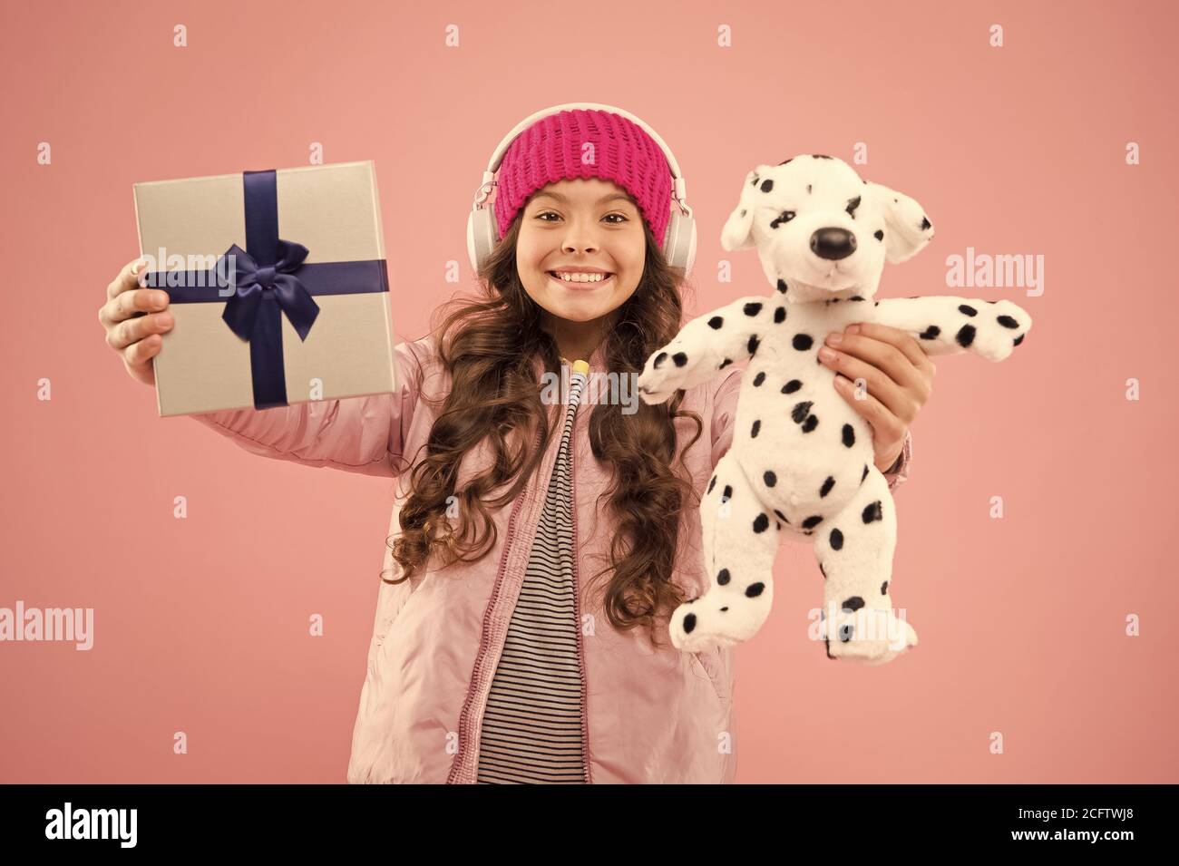 User Favorites Image teen girls 1 Best gifts for teen girls. Stylish schoolgirl play with dog toy and hold  gift box. Girl little fashionable cutie with headphones carry soft toy.  Take favorite toy with you. Happy childhood concept