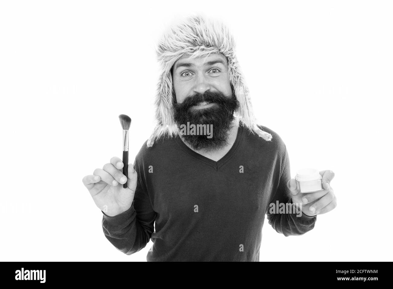 Man bearded fashion stylist wear hat hold brush for applying