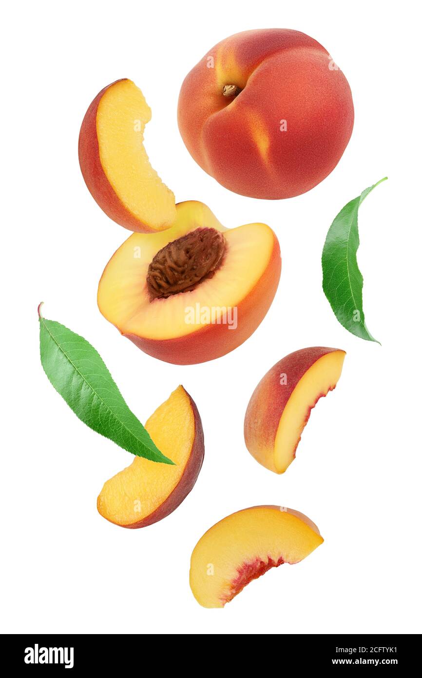 falling ripe peach slices isolated on white background Stock Photo - Alamy