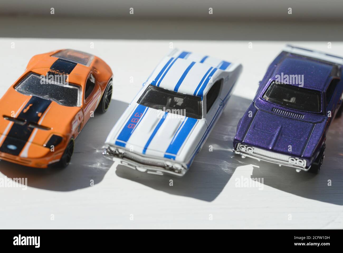 Three diecast model toy cars Hotwheels Stock Photo