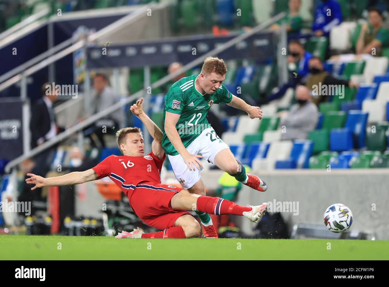 Belfast, County Antrim, Northern Ireland. 07th Sep, 2020. 7th September 2020; Windsor Park, Belfast, County Antrim, Northern Ireland; EUFA Nations League, Group B, Northern Ireland versus Norway; Jonas Svensson of Norway wins the ball against Northern Ireland's Shayne Lavery Credit: Action Plus Sports Images/Alamy Live News Stock Photo