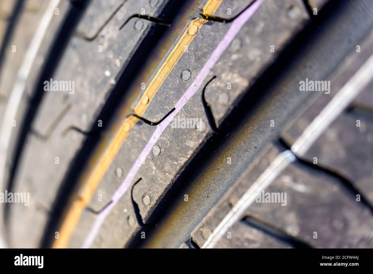Detail of the grooves of a new car tire Stock Photo Alamy