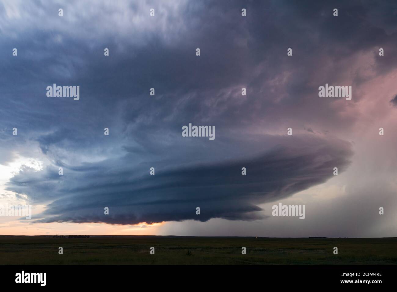 Great plains landscape with a striated supercell thunderstorm cloud near Martin, South Dakota Stock Photo