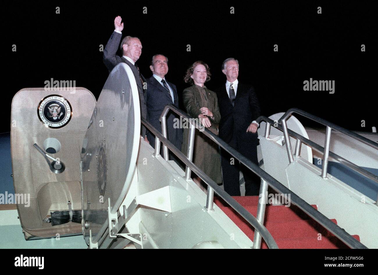 1982 - From (left to right), former President Gerald R. Ford, Richard Nixon, former First Lady Rosalynn Carter and former President Jimmy Carter wave good-by as they prepare to depart for Egypt.  They will attend the funeral for slain Egyptian President Anwar Sadat. Stock Photo