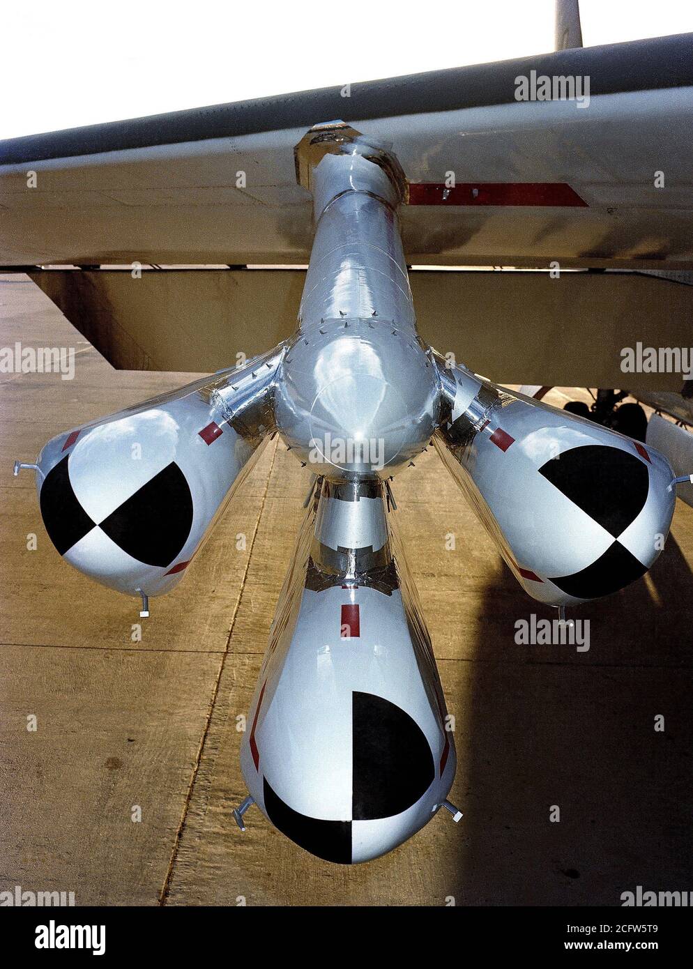 1979 - A close-up view of a AGM-109 Tomahawk air-launched cruise missile loaded on a B-52 Stratofortress aircraft. Stock Photo