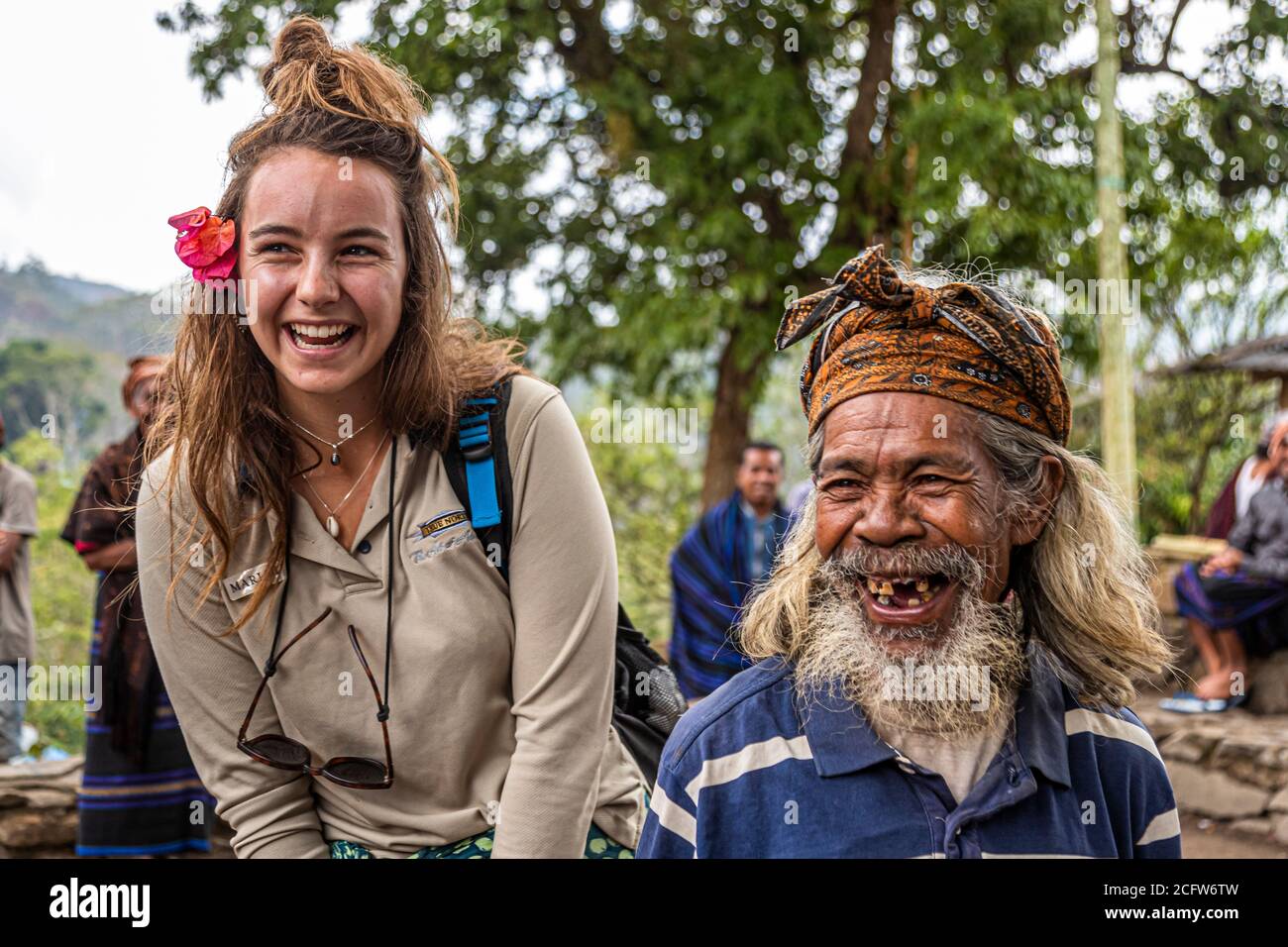 Humorous exchange between cultures, Sunda Islands, Indonesia Stock Photo
