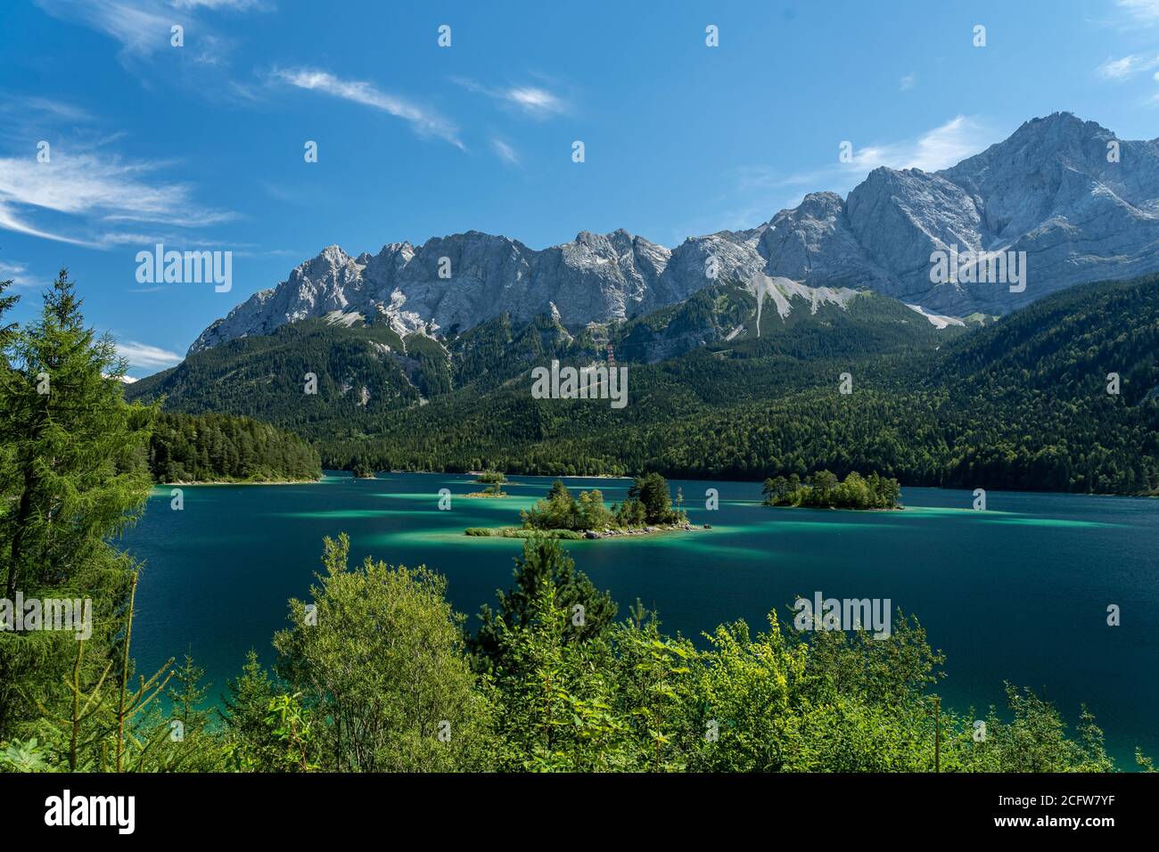 view on the beautiful zugspitze mountain and the eibsee in bavaria ...
