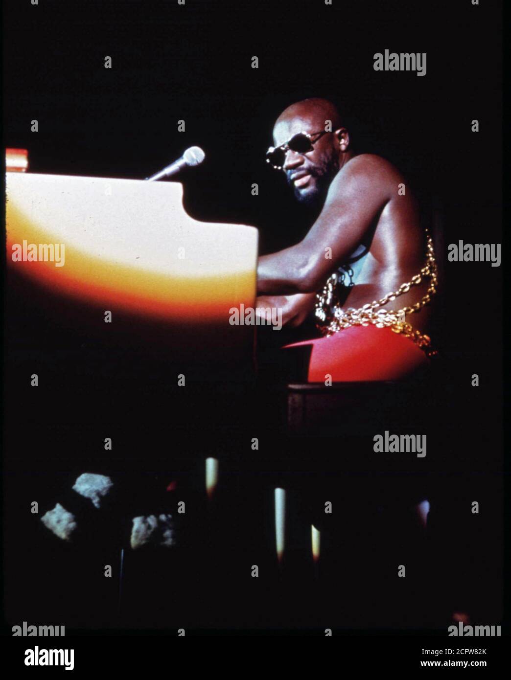 R&B and Soul Singer Isaac Hayes performs on his piano at the Push Black Expo in 1973, an event sponsored by Jesse Jackson's Push Organization Stock Photo