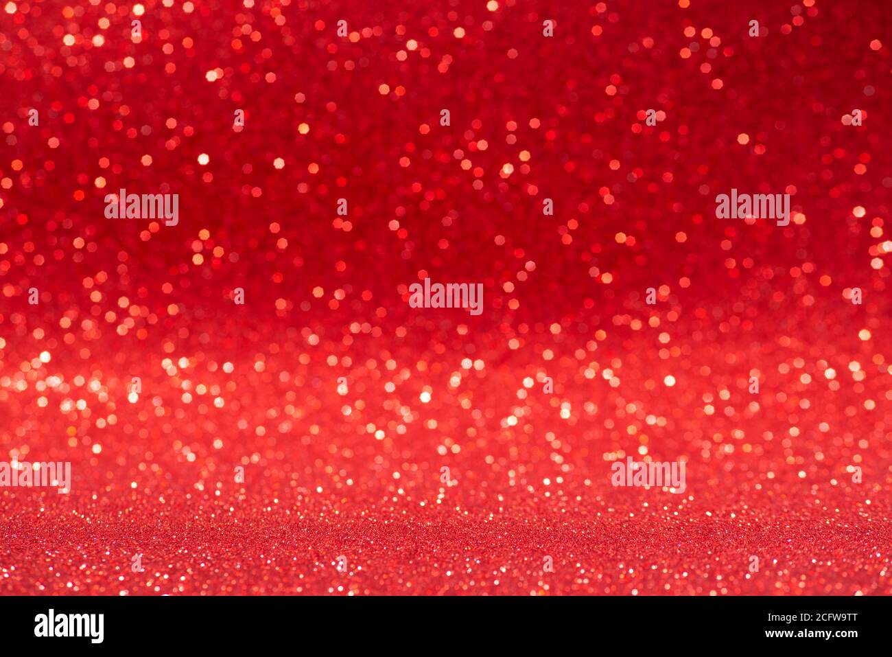 red glitter background with blur and bokeh Stock Photo Alamy
