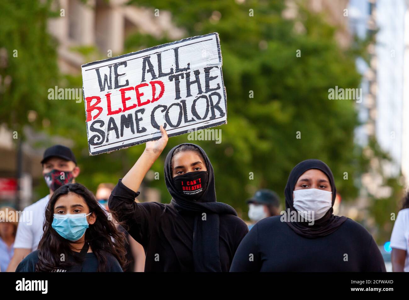 Washington, DC, USA, September 7, 2020. Pictured: Three young women, who are members of the only mosque choir in the United States, participate in Let Freedom Sing, a community-building protest and voter registration event by the Freedom Day Foundation and Head Count, respectively. Credit: Allison C Bailey/Alamy Credit: Allison Bailey/Alamy Live News Stock Photo