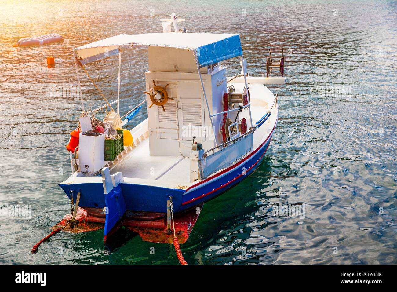 Vintage wooden boat in coral sea. Boat drone photo. Fishing boats in clear  turquoise ocean, top view. Small fishing boat moored in blue clean transpar  Stock Photo - Alamy