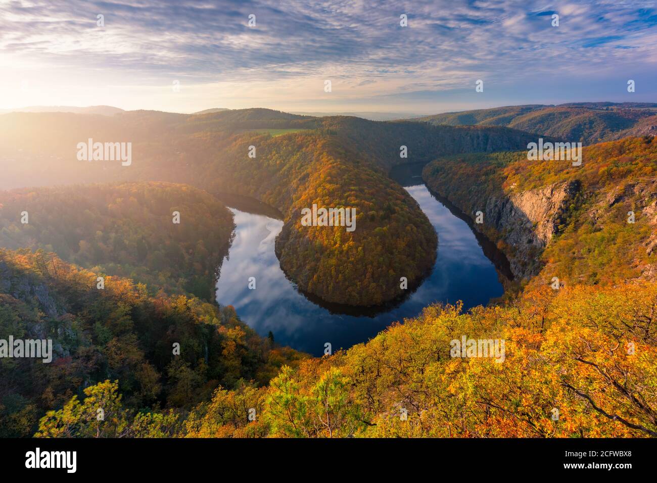 Beautiful Vyhlidka Maj, Lookout Maj, near Teletin, Czech Republic. Meander of the river Vltava surrounded by colorful autumn forest viewed from above. Stock Photo