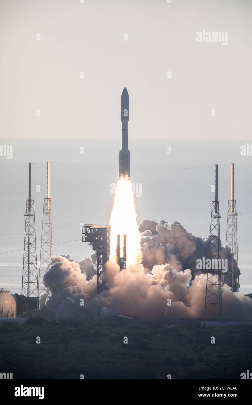 CAPE CANVERAL, FL, USA - 30 July 2020 - With blue sky as a backdrop, a United Launch Alliance Atlas V 541 rocket lifts off from Space Launch Complex 4 Stock Photo