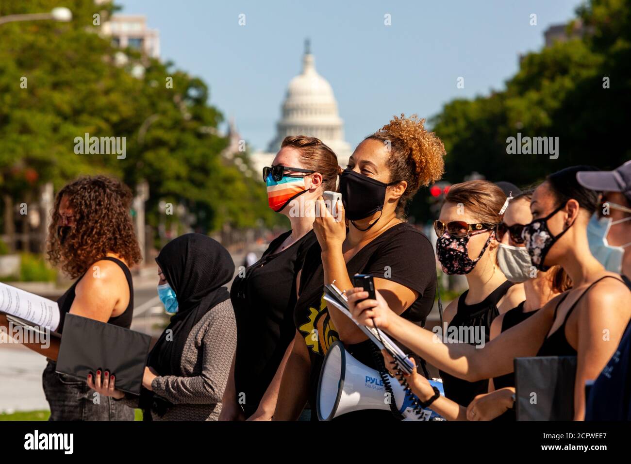 Washington, DC, USA, September 7, 2020. Pictured: Members of Songrise and the Justice Choir of DC sing during Let Freedom Sing, with the United States Capitol in the background. Let Freedom Sing was a community-building protest and voter registration event by the Freedom Day Foundation and Head Count. Credit: Allison C Bailey/Alamy Credit: Allison Bailey/Alamy Live News Stock Photo