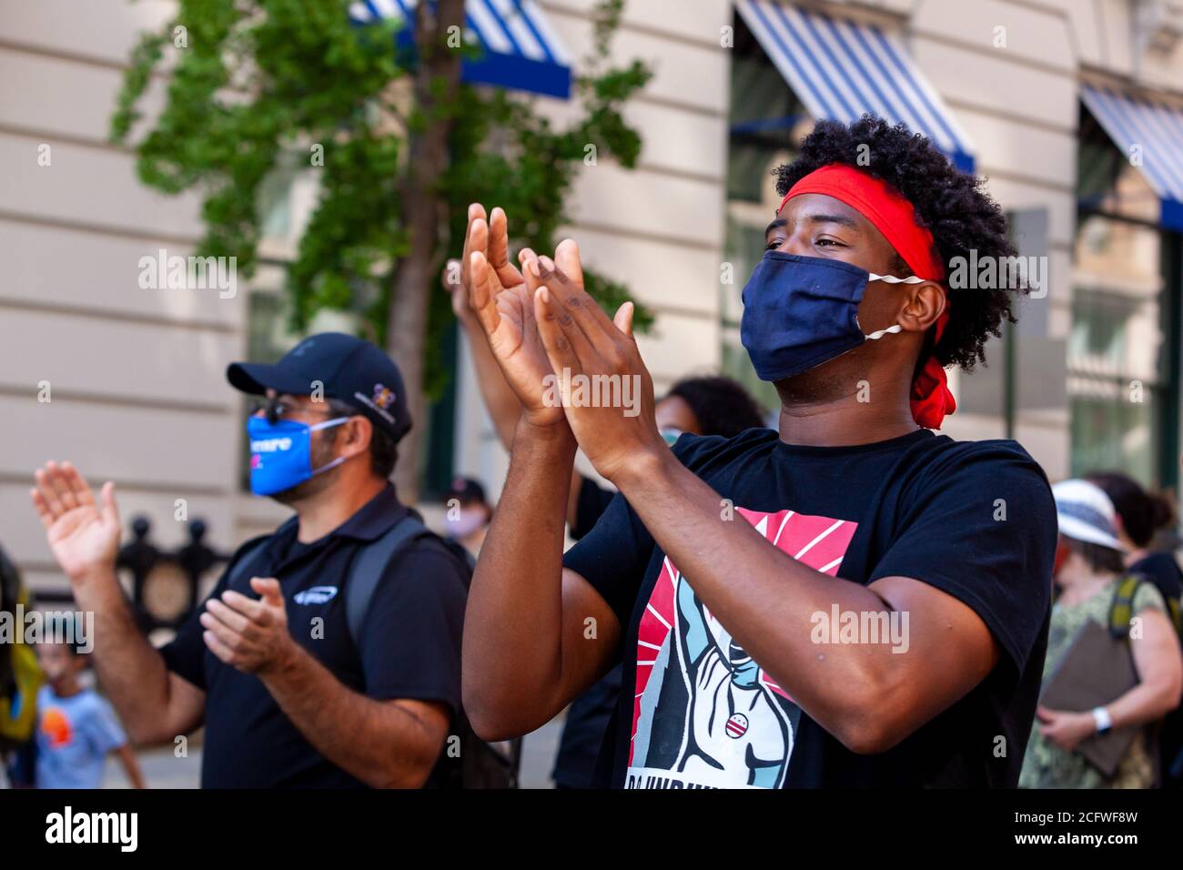 Washington, DC, USA, September 7, 2020. Pictured: Protesters clap and keep the beat as they sing during the Let Freedom Sing March en route to Freedom Plaza. Let Freedom Sing was a community-building protest and voter registration event by the Freedom Day Foundation and Head Count. Credit: Allison C Bailey Credit: Allison Bailey/Alamy Live News Stock Photo