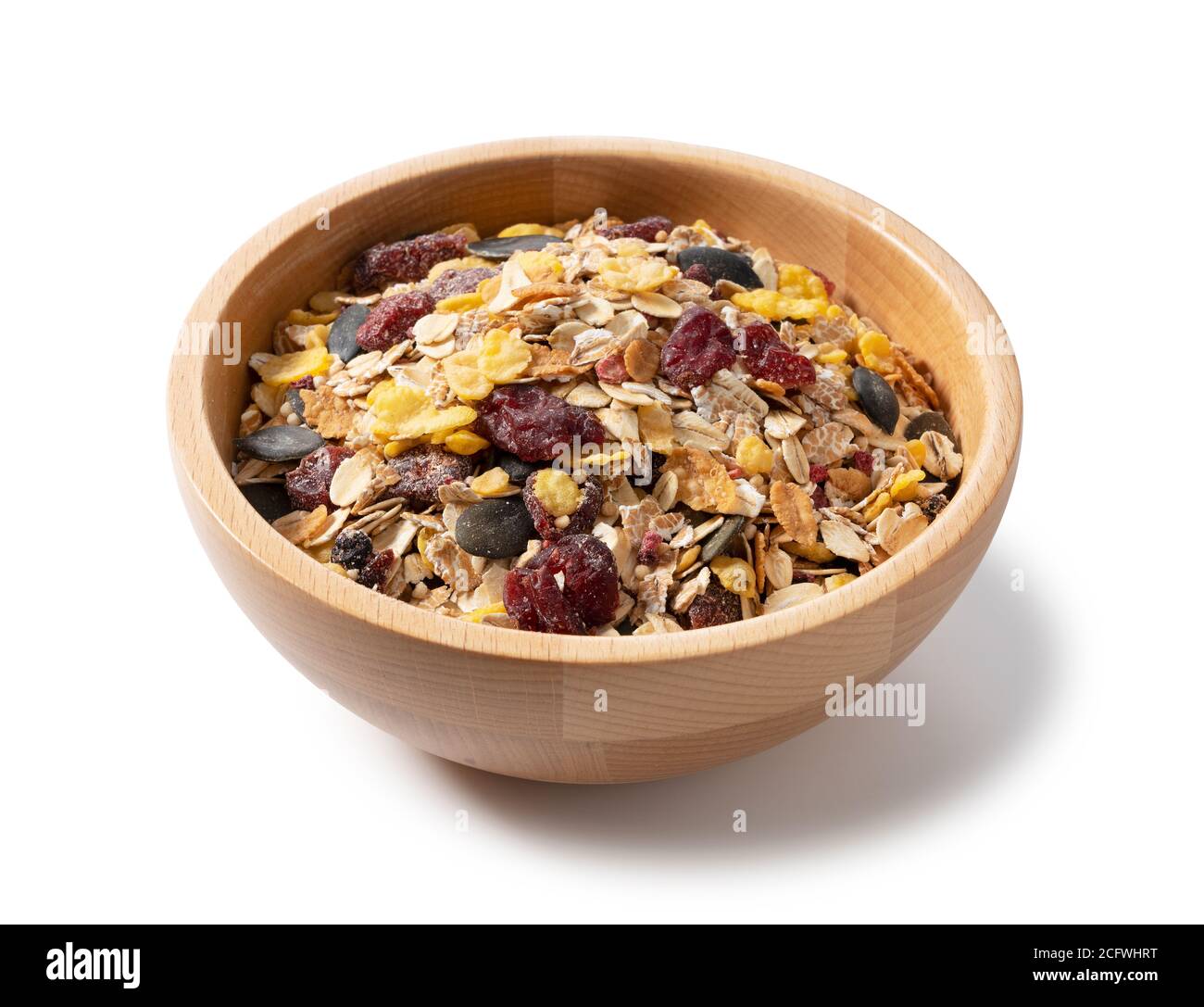 Granola in a container placed on a white background was photographed