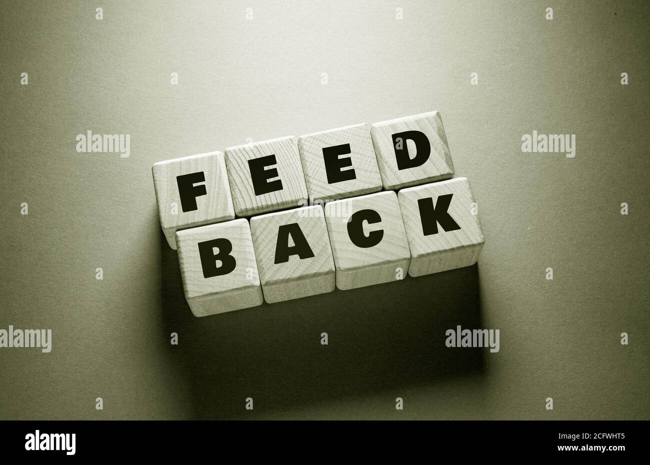 Feed Back Word Written on Wooden Cubes Stock Photo