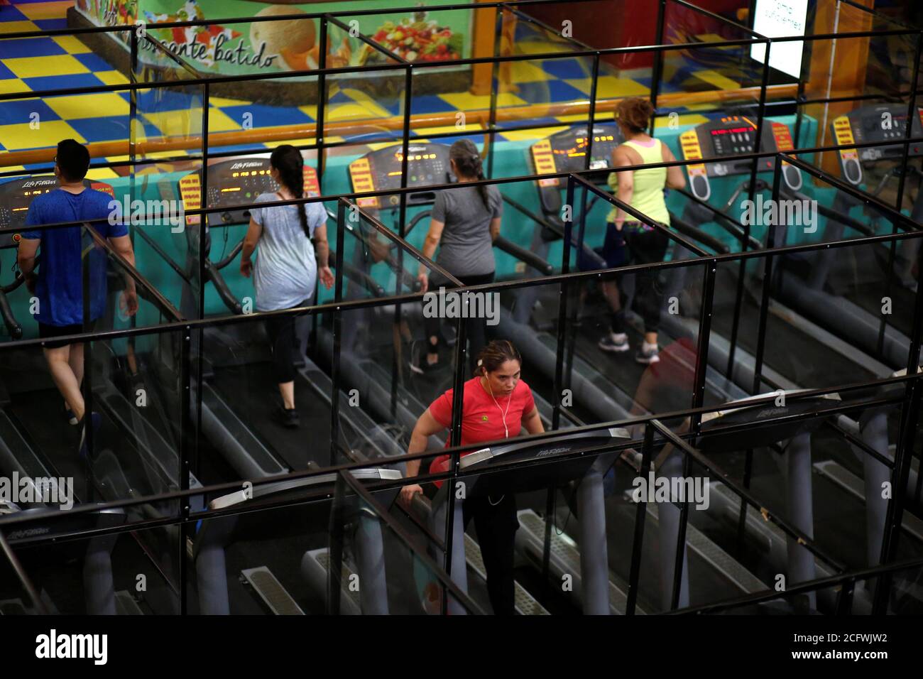 Members exercise at Bally Sport Center, after a five-month quarantine, amid  the coronavirus disease (COVID-19) pandemic, in Antiguo Cuscatlan, El  Salvador September 7, 2020. REUTERS/Jose Cabezas Stock Photo - Alamy