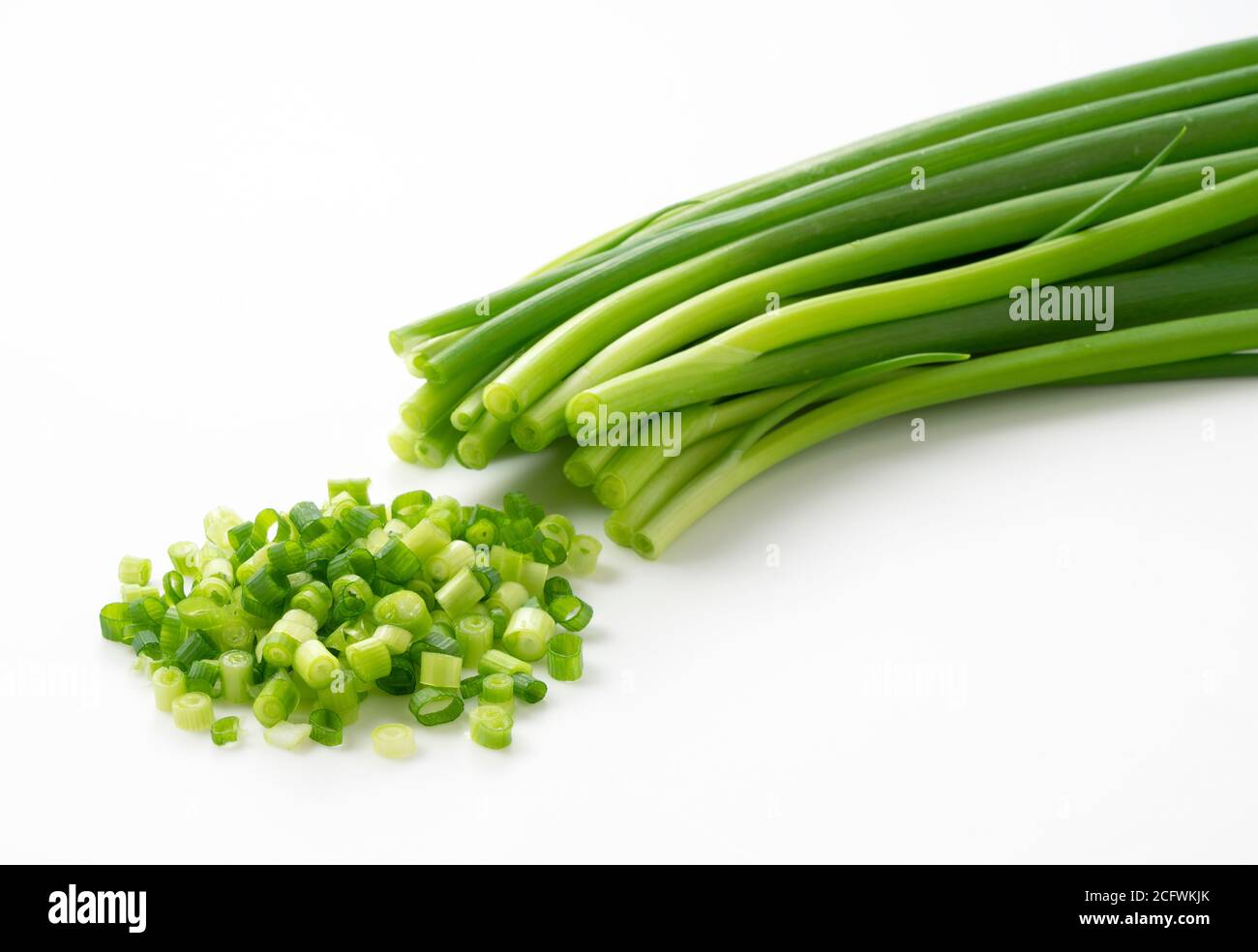 Chopped green onions placed on a white background were photographed ...