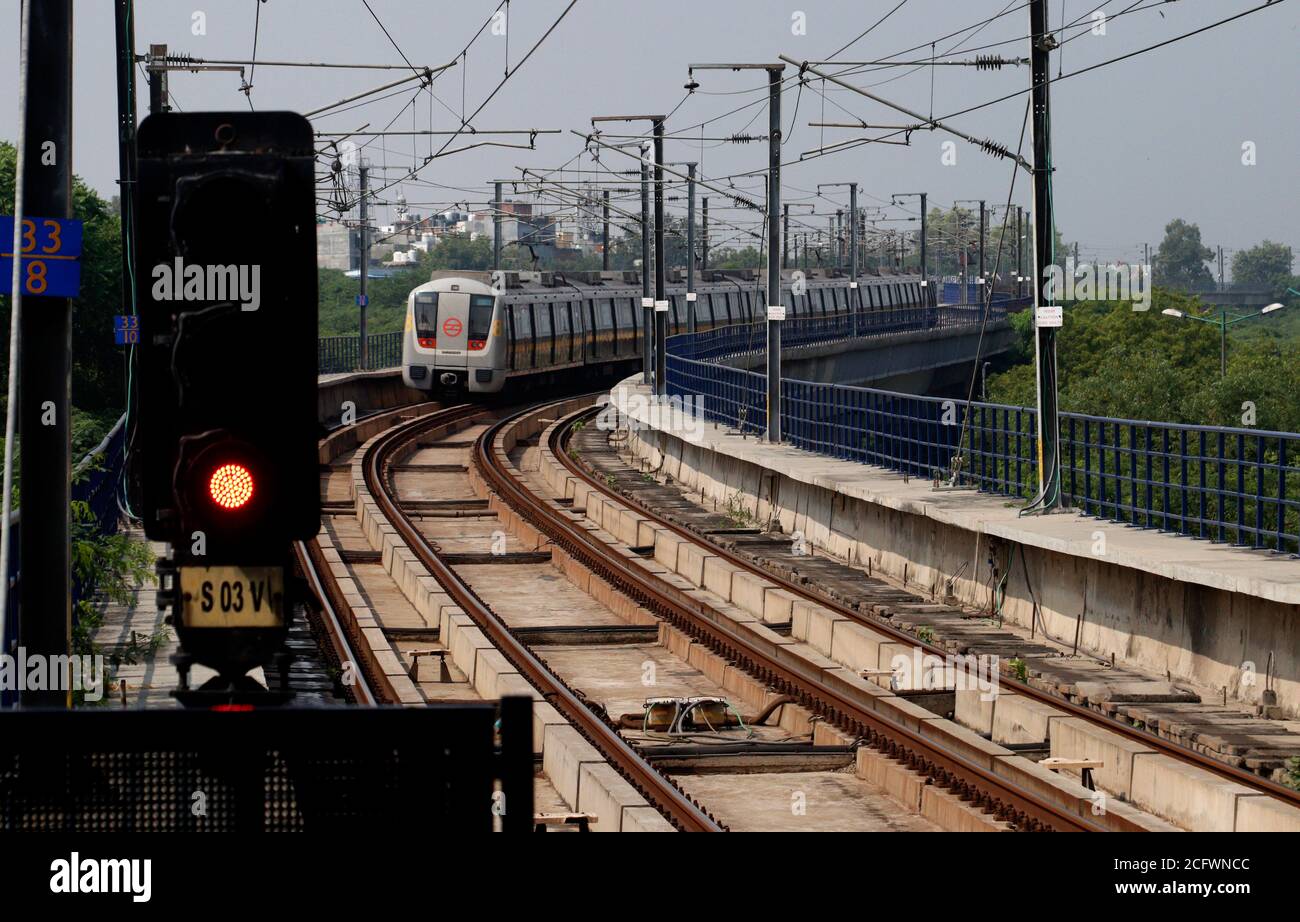 New Delhi, India. 07th Sep, 2020. A Delhi Metro is seen taking passengers between Samaypur Badli and Huda City Centre on the first day of its reopening after 5 months lockdown due to Covid-19.On the first day, the yellow line between HUDA City Centre and Samaypur Badli, will run from 7 to 11 am, and 4 to 8 pm in the 2nd phase. The metro will resume full services from September 12. Credit: SOPA Images Limited/Alamy Live News Stock Photo