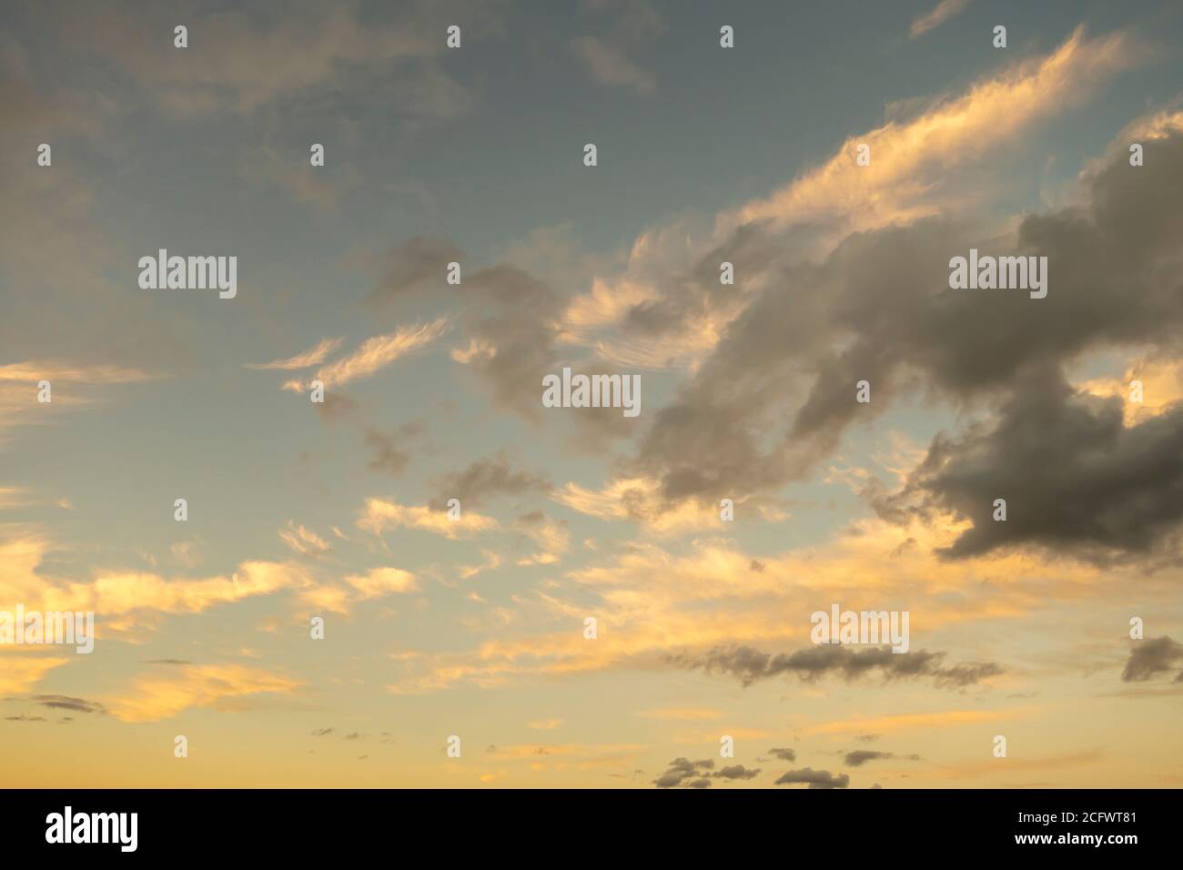 Dark and light clouds on a sunset sunrise day Stock Photo