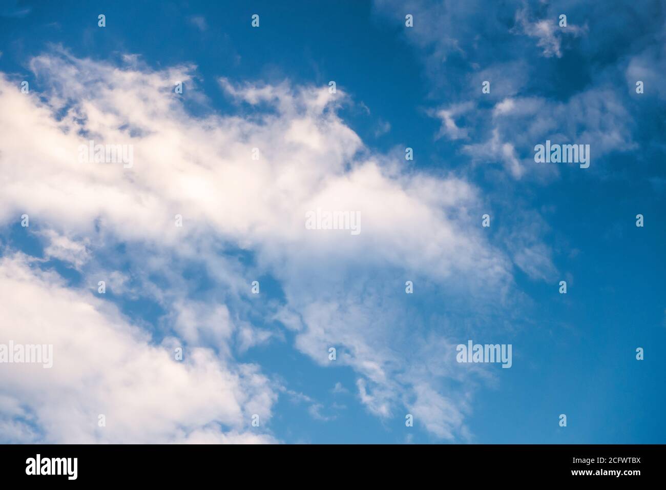 white clouds on deep day blue sky Stock Photo