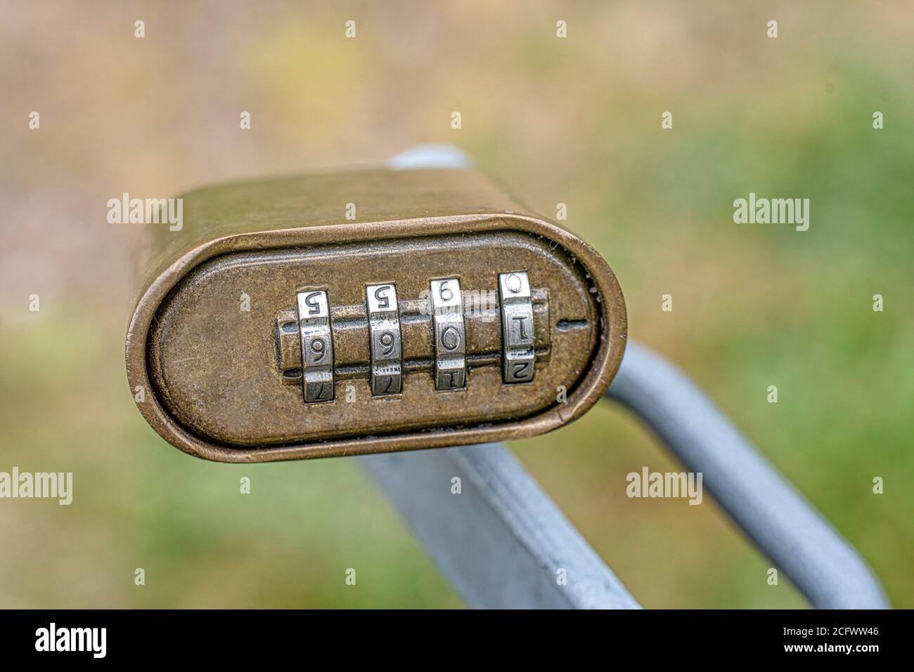 Old Padlock attached to a grey handle with the combination 1066, Denmark, June 8, 2020 Stock Photo