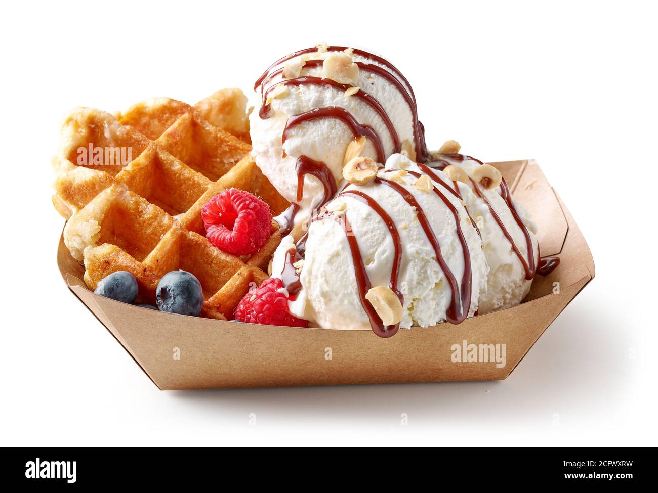 belgian waffle with fresh berries and vanilla ice cream in paper take ...