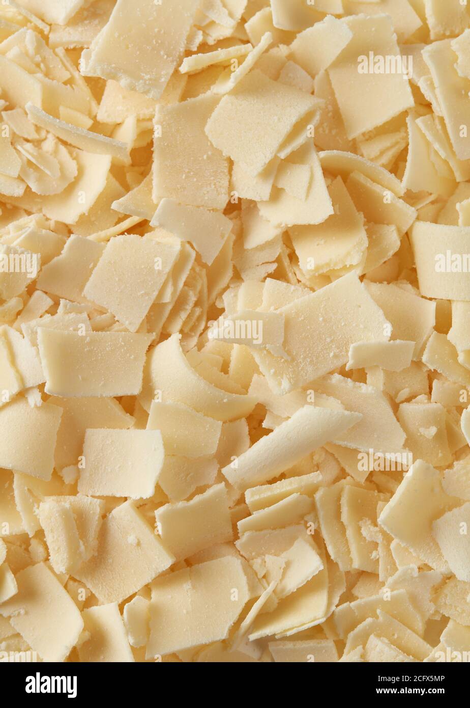 Parmesan flakes background Stock Photo Alamy