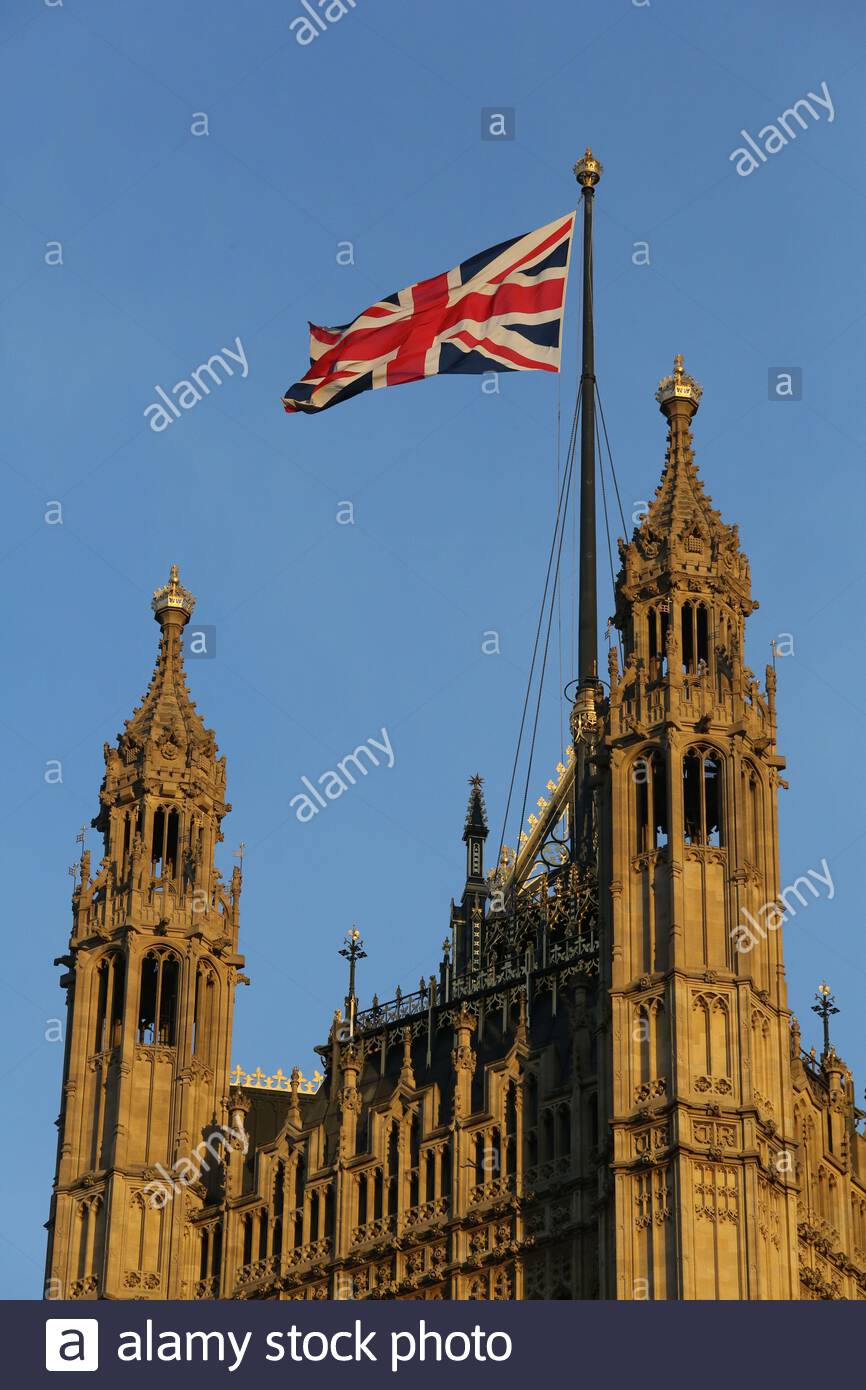 A shot of the Union Jack above the Palace of Westminster the day after the EU Referendum vote in 2016 Stock Photo