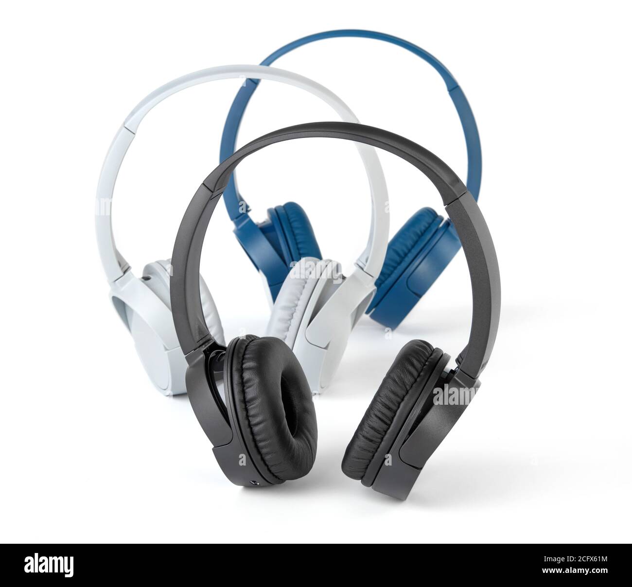 Wireless headphones on white background Stock Photo - Alamy