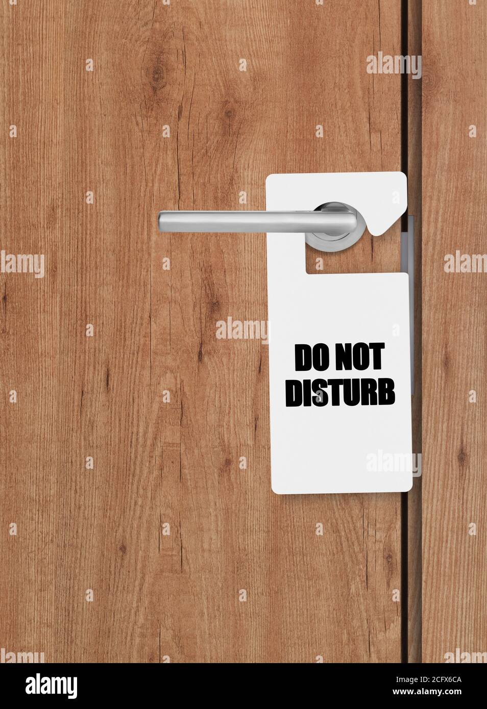 Do not disturb sign on door handle Stock Photo - Alamy