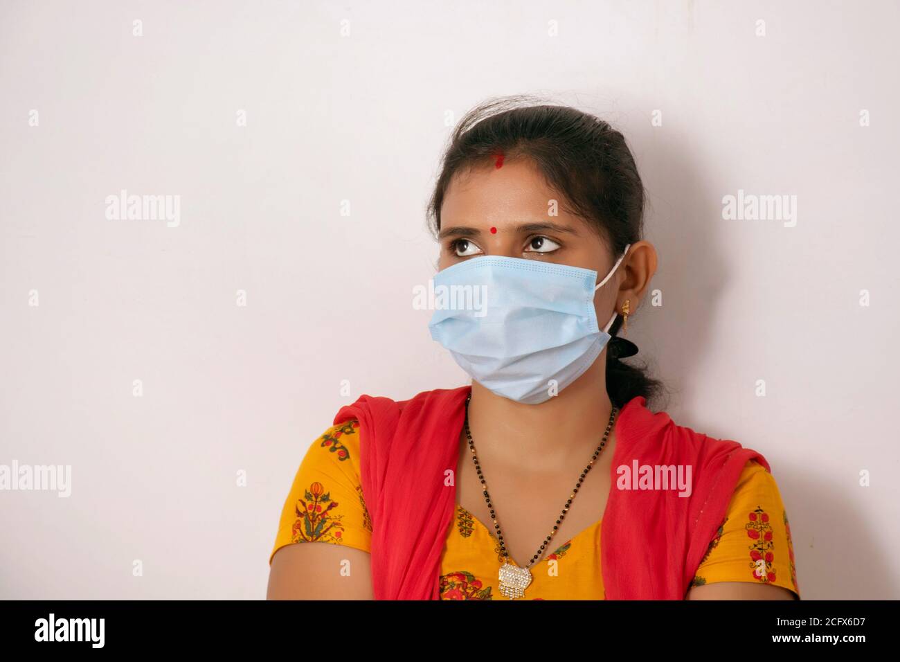 Indian woman wearing mask Stock Photo Alamy