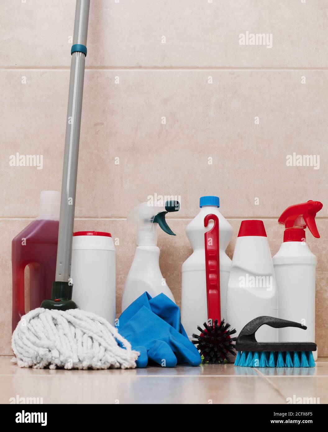 Cleaning equipment on bathroom floor tiles Stock Photo - Alamy