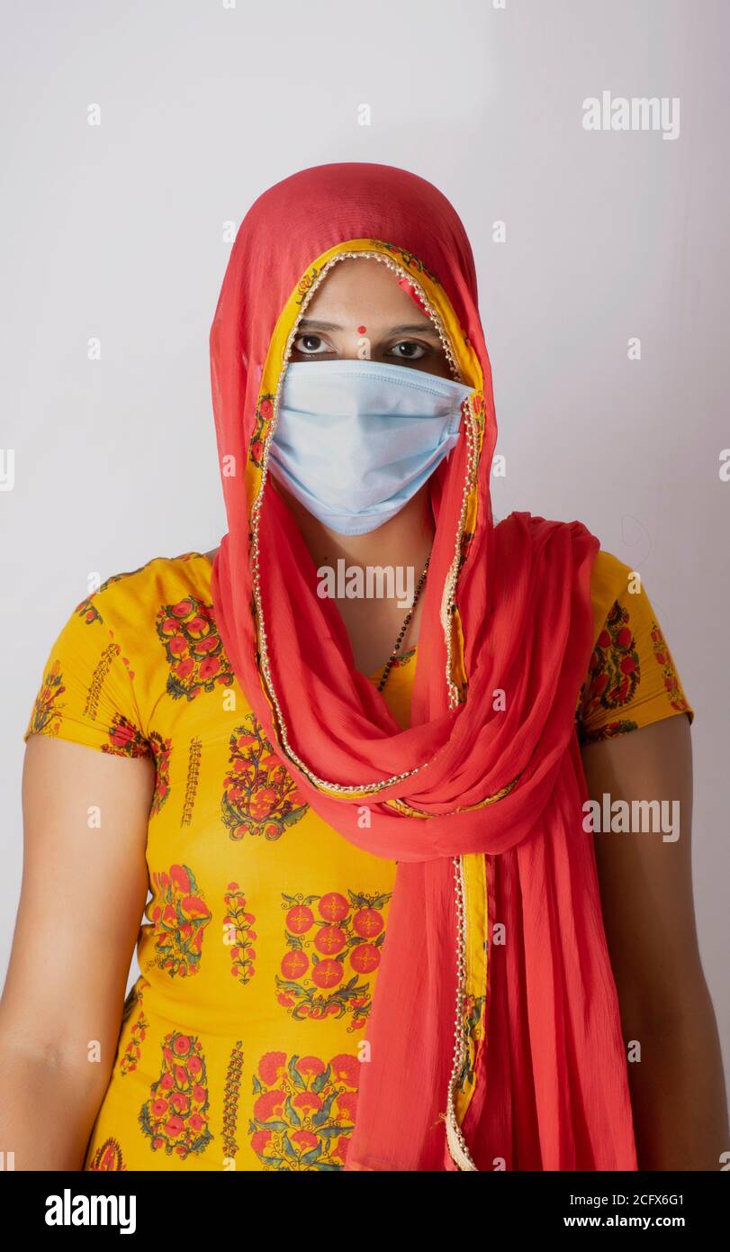 Indian woman wearing mask Stock Photo Alamy